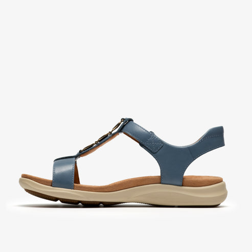 A light blue leather T-strap sandal with a tan sole.