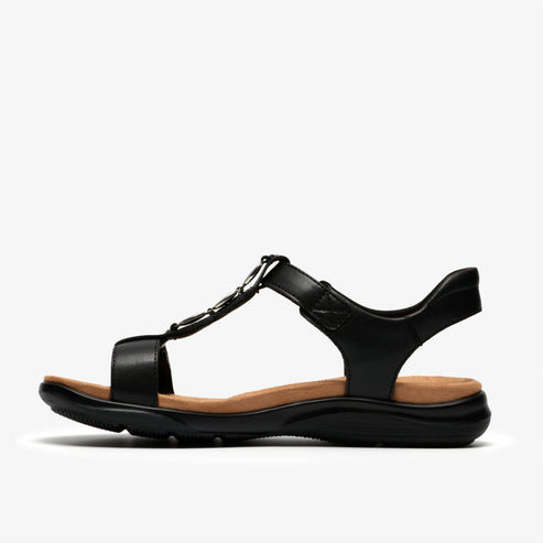 Black flat sandal with t-strap and ankle strap.