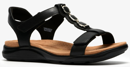Black sandal with adjustable straps and decorative stones.