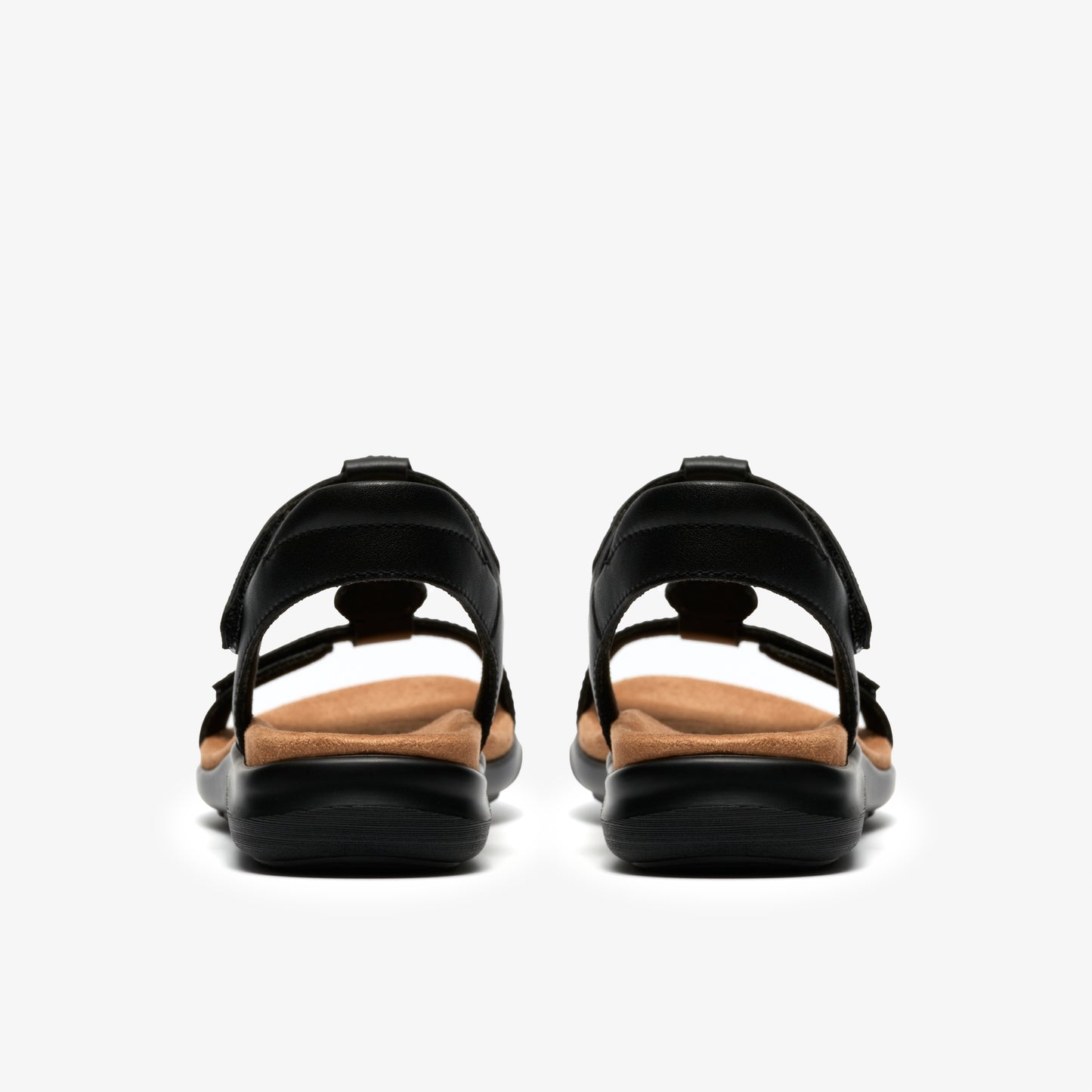 Pair of black sandals with velcro straps.