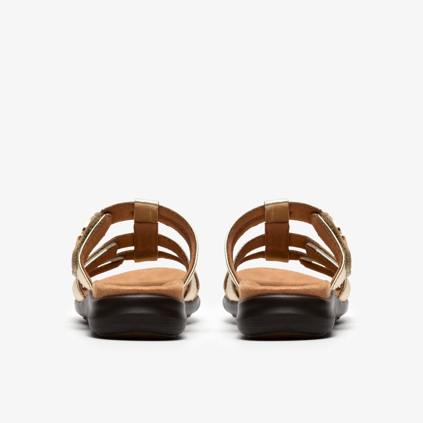 Pair of gold, multi-strap sandals viewed from the back.