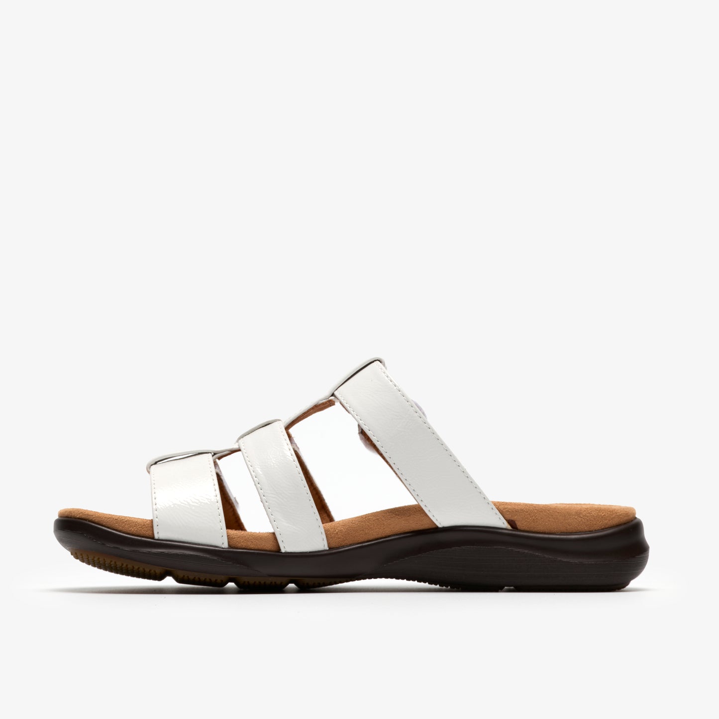 White sandal with a flat brown sole and three top straps.
