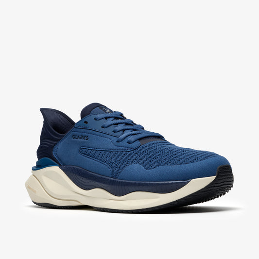 A blue athletic shoe with a thick, white sole and a dark rubber outsole.