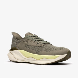 Olive green athletic shoe with a light yellow midsole.