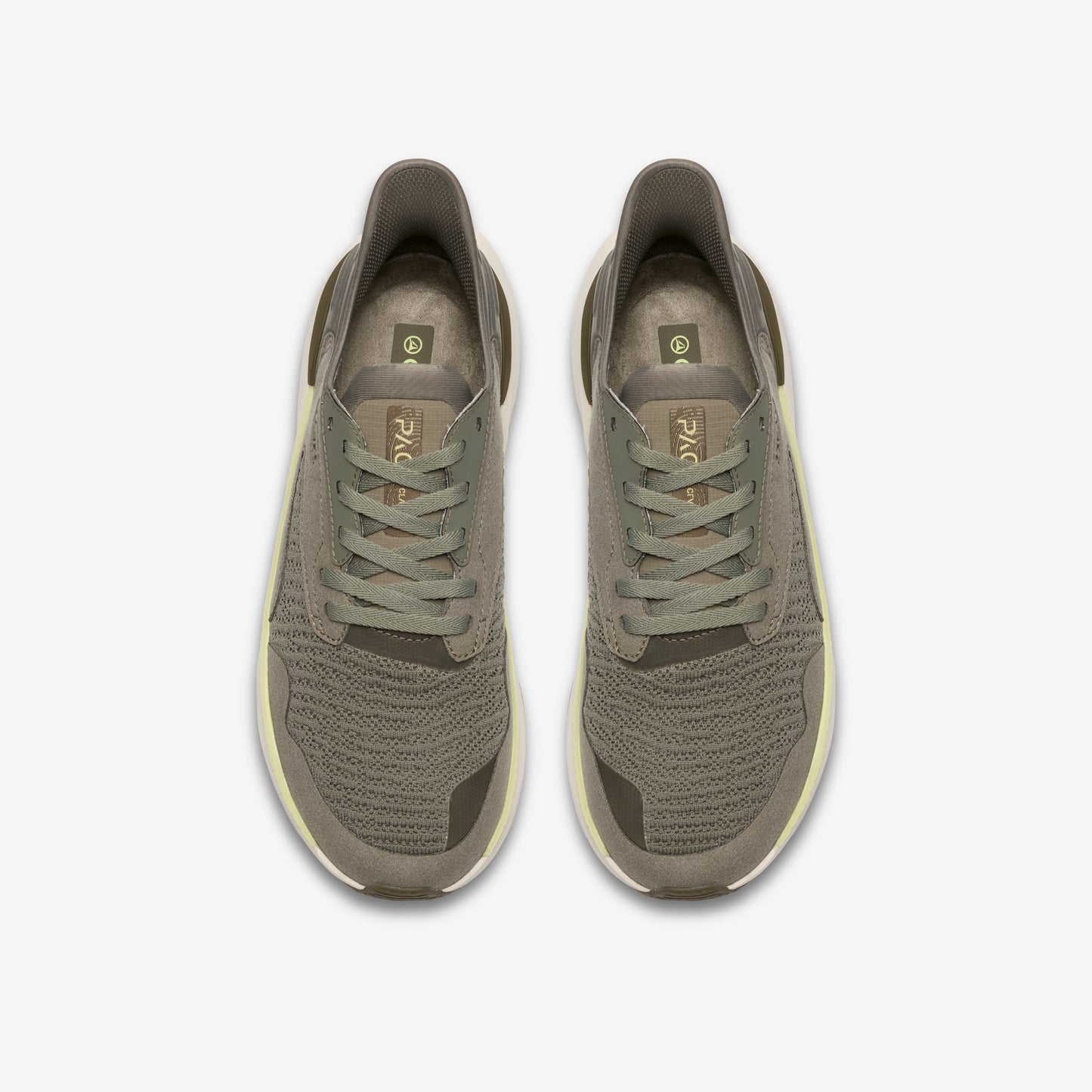 Top-down view of a pair of gray running shoes with olive green laces.