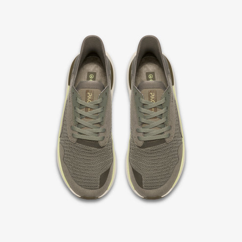 Top-down view of a pair of gray running shoes with olive green laces.
