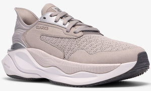 Low-top sneaker, light gray mesh upper, metallic silver accents, thick white and gray sole.