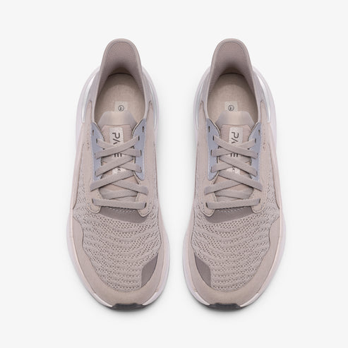 Pair of gray running shoes, top view.