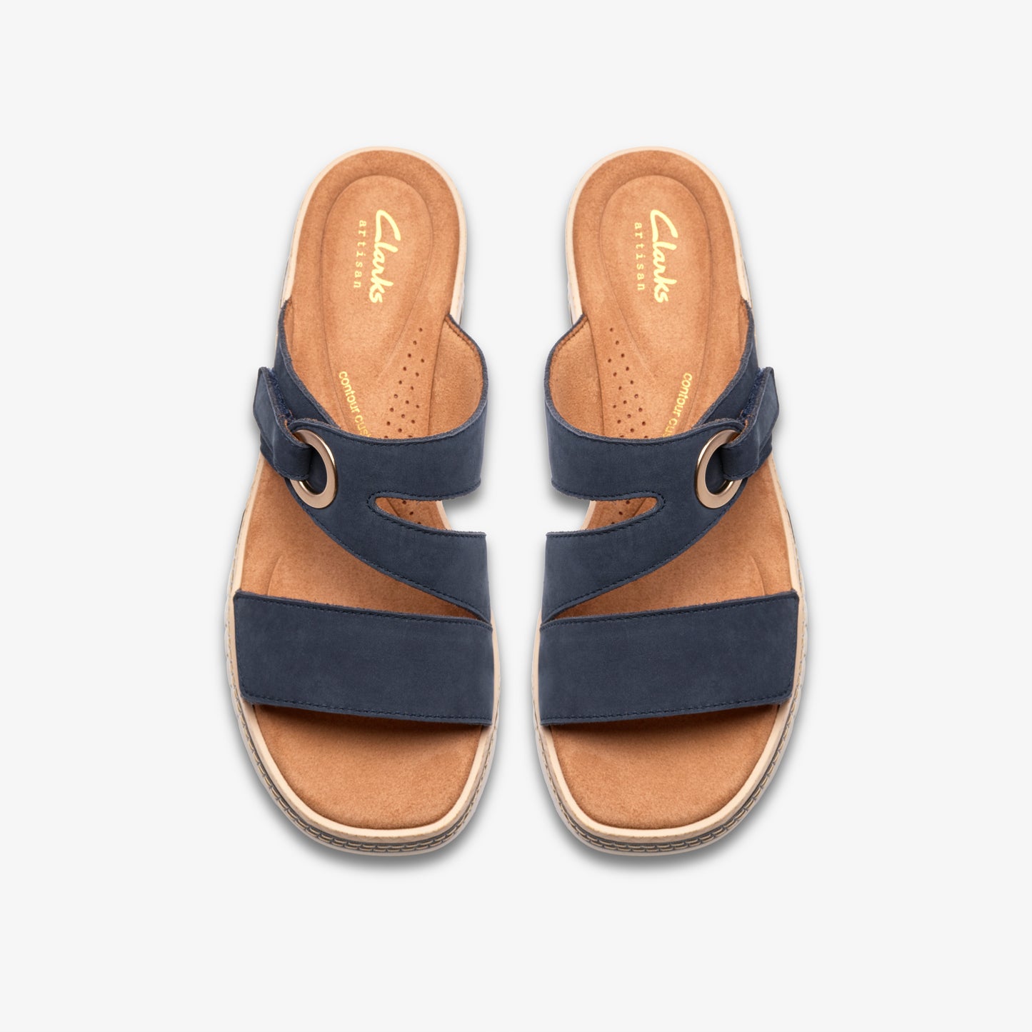 Pair of navy sandals, top view, with beige inner soles and adjustable straps.