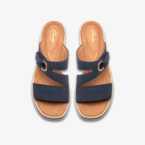 Pair of navy sandals, top view, with beige inner soles and adjustable straps.