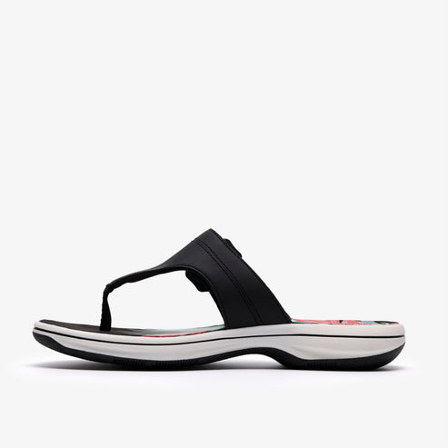 Black thong sandal with cushioned sole.