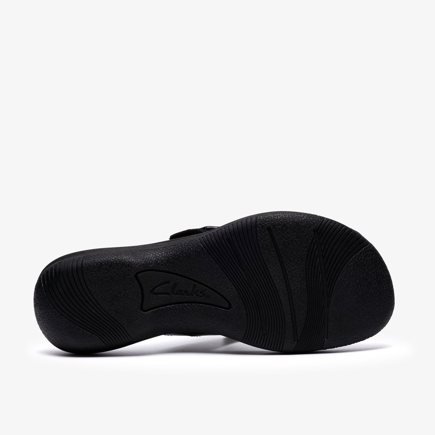 Bottom view of a black sandal showing the patterned sole with the name 'Clarks' visible.