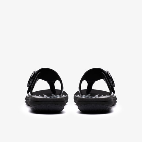 Pair of black flip-flops with adjustable straps seen from the back.
