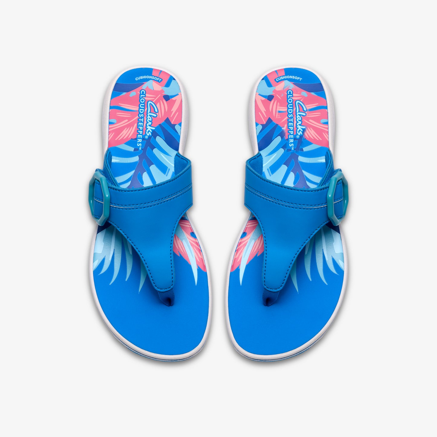 A pair of blue flip-flops with palm leaves pattern and buckle.