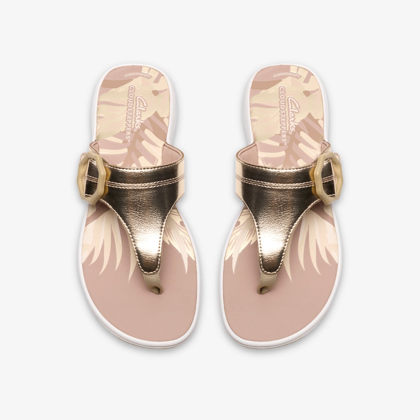 Pair of toe-post sandals with a floral sole and buckled strap.