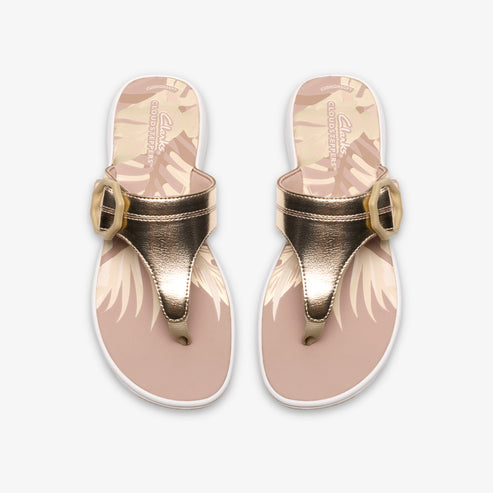 Pair of toe-post sandals with a floral sole and buckled strap.