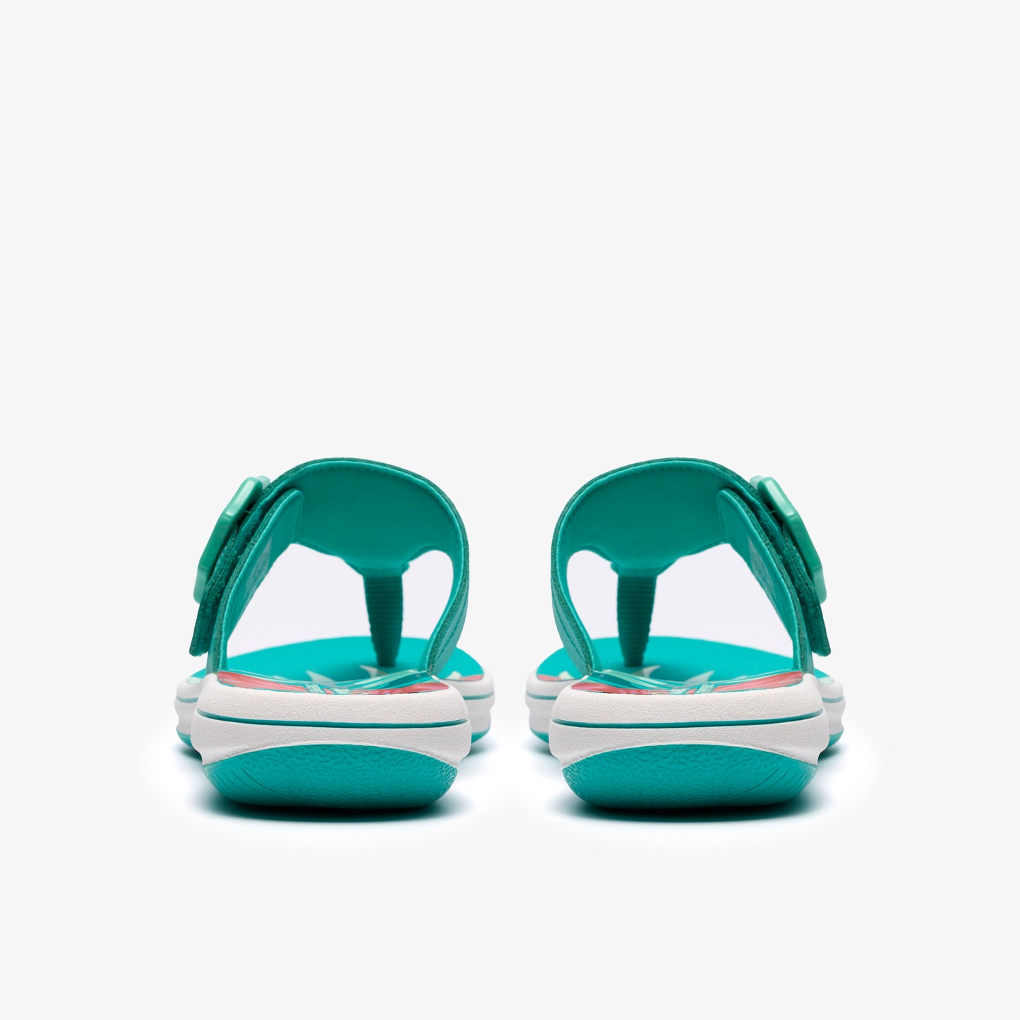 A pair of teal flip-flops with a bow.