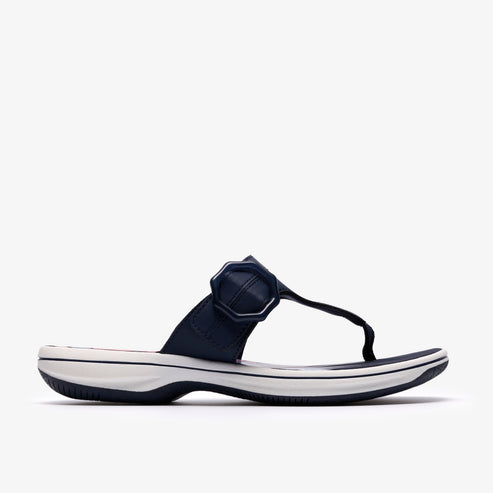 Navy blue thong sandal with an ornamental buckle.