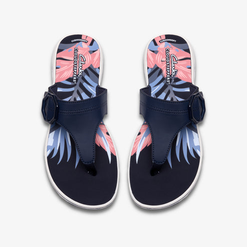 Navy thong sandals with a floral pattern footbed and adjustable buckle strap.