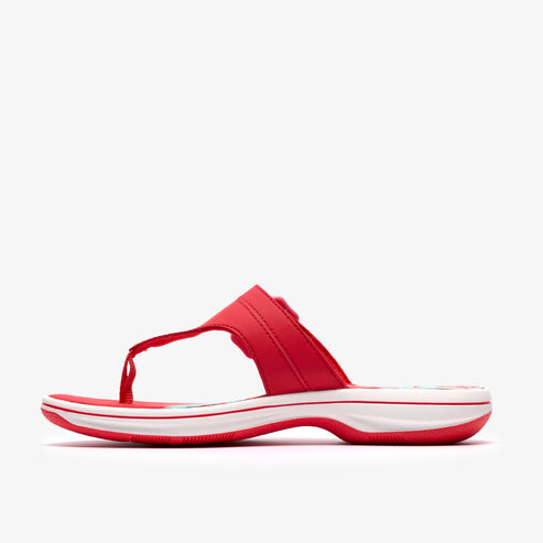 Red flip-flop sandal with a white sole.
