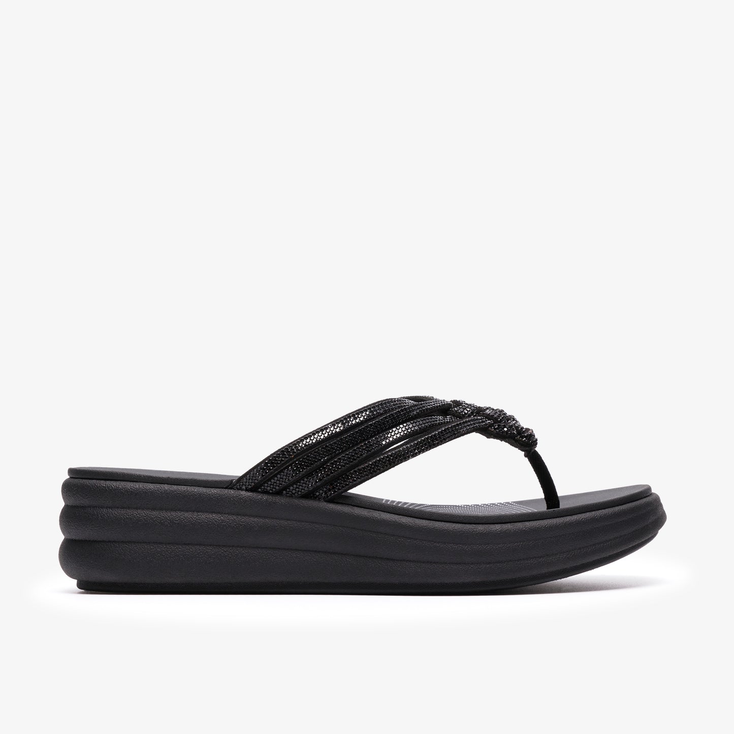 Black platform sandal with a thong strap made up of braided strips.