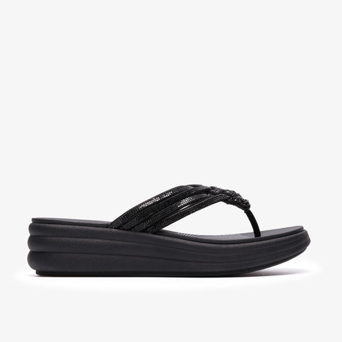 Black platform sandal with a thong strap made up of braided strips.