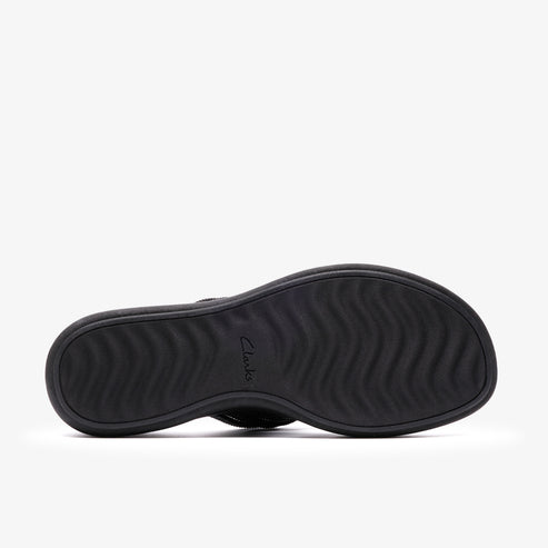 Black sandal sole with a wavy pattern and the word "Clarks" embossed in the center.