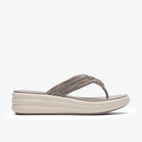 Platform flip-flop sandal with glittery straps.