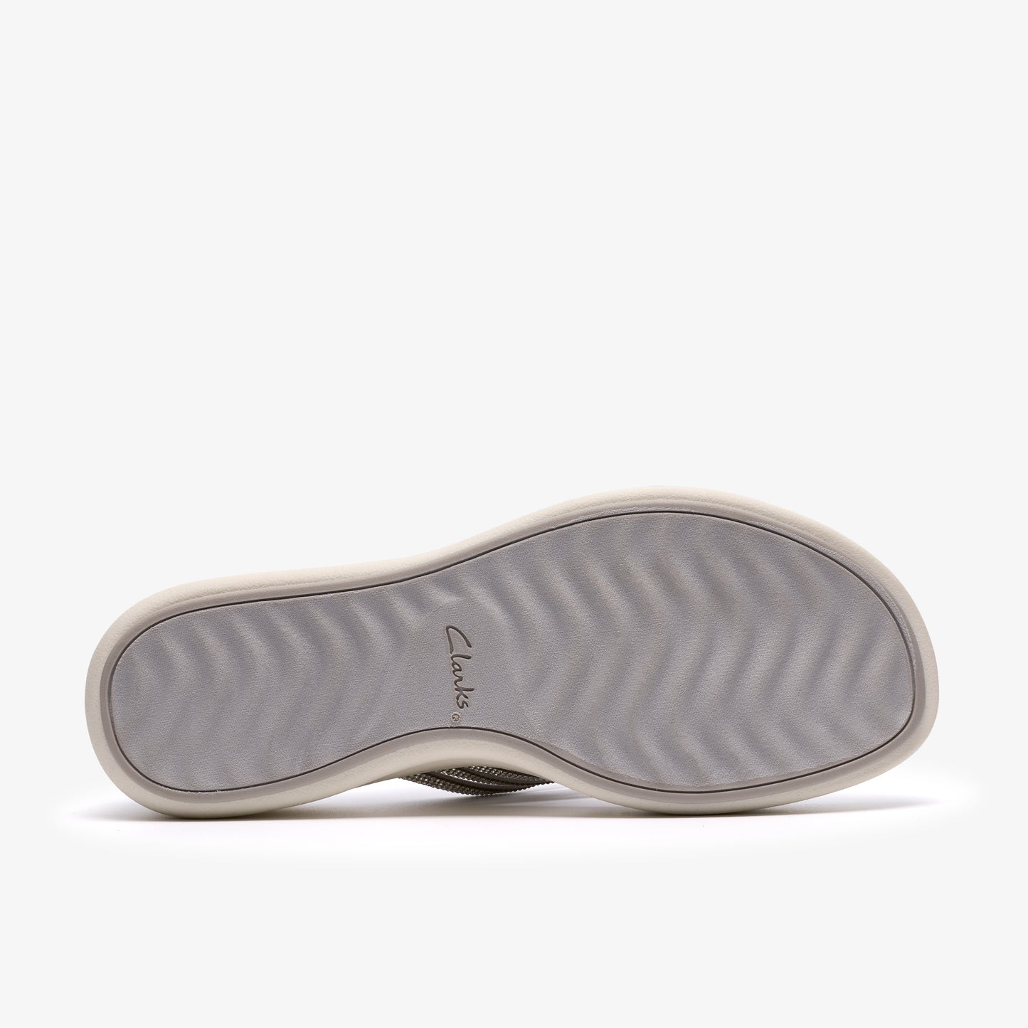 Shoe sole with wave tread and Clarks logo.