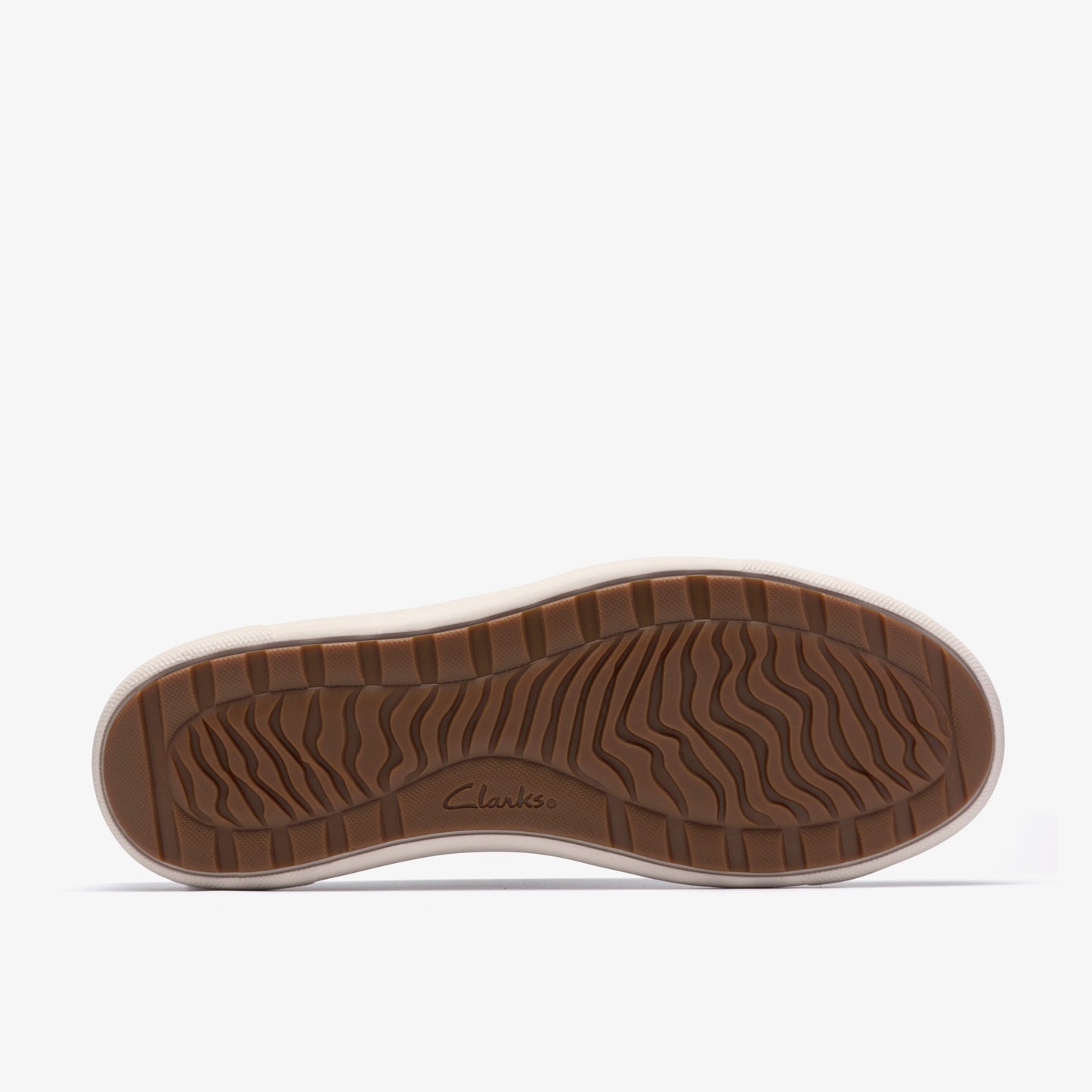 Shoe sole, dark brown with wave pattern.