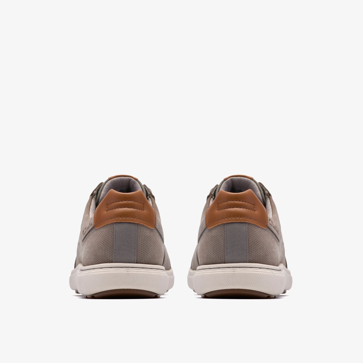 Back view of pair of gray sneakers with brown accents and white soles.