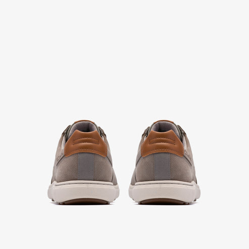 Back view of pair of gray sneakers with brown accents and white soles.