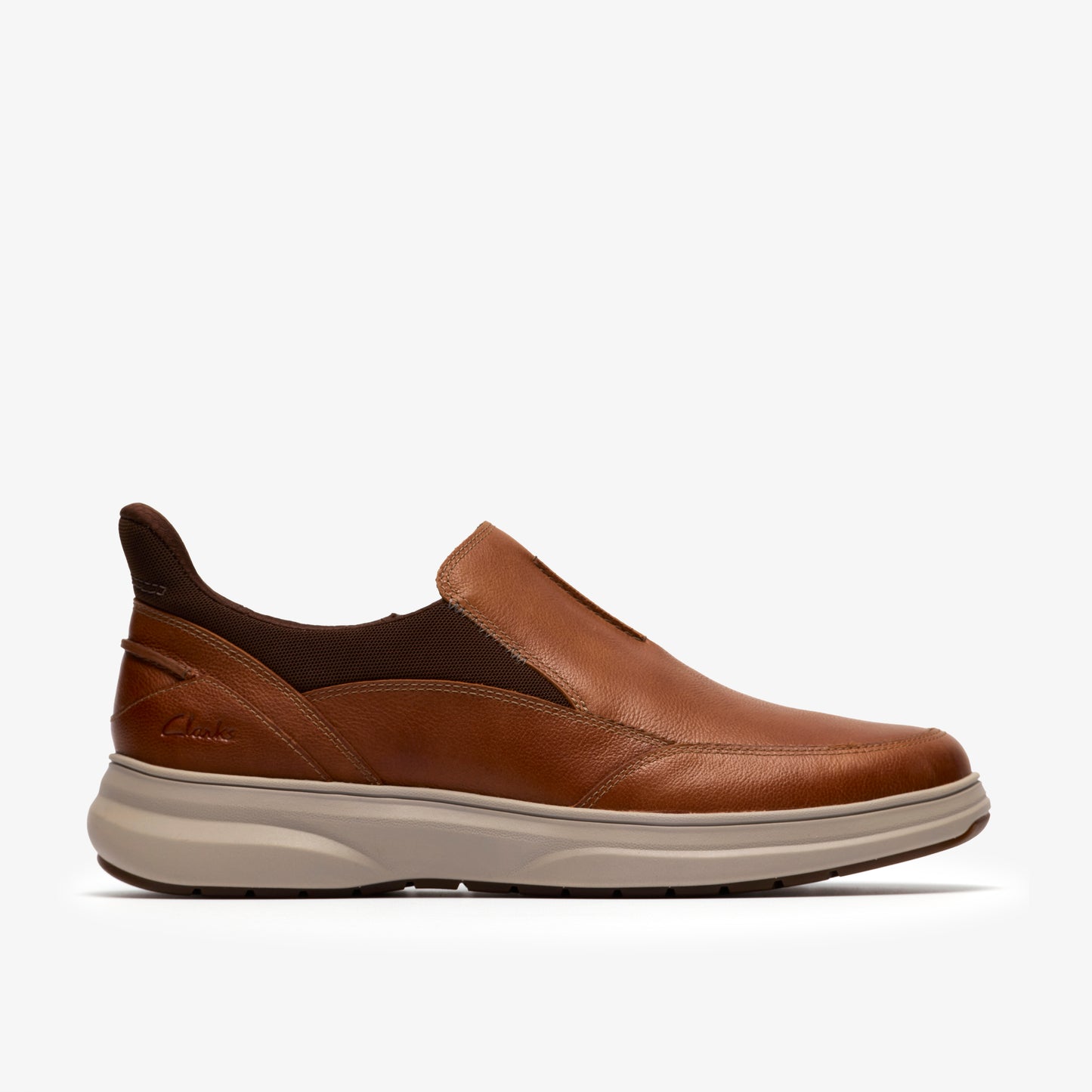 Brown leather slip-on shoe with a light-colored sole.