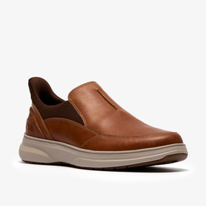 Slip-on brown leather shoe with tan sole and padded collar.
