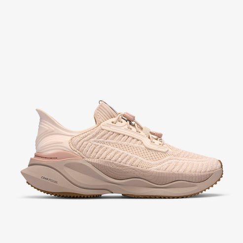 Beige sneaker with knit upper and light brown sole.