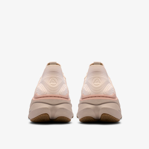 Rear view of two light-colored athletic shoes with round heel design.