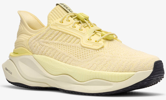 A yellow athletic shoe with a toggle lacing system and visible "CLAP" text on the tongue.