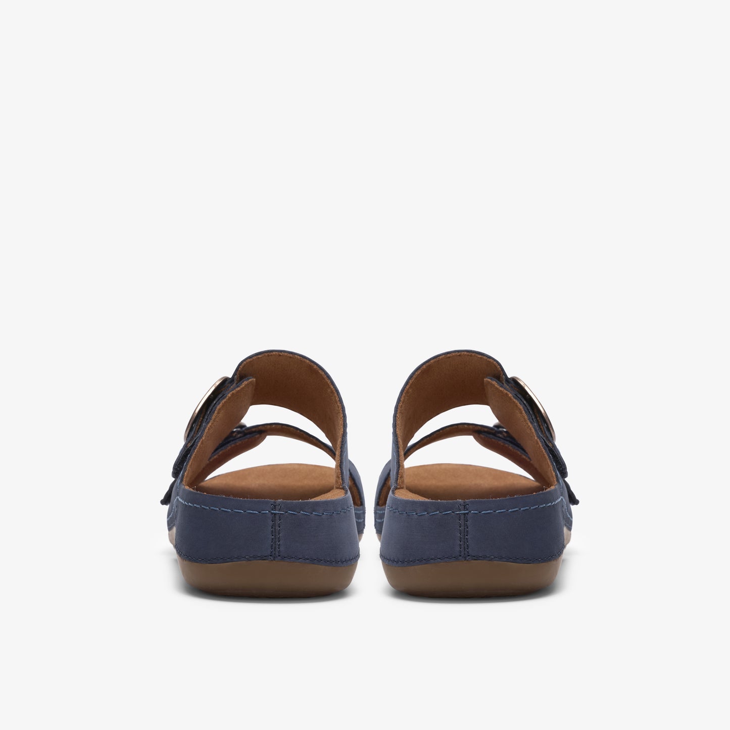 Pair of blue sandal shoes with brown insoles seen from behind.