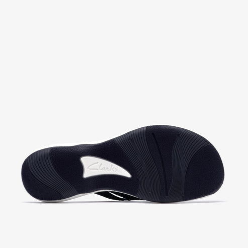 Sole of a dark athletic shoe with white text.