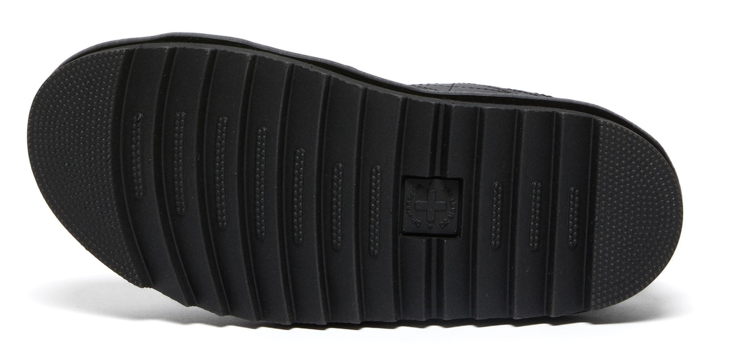 a black shoe sole with horizontal ridges and a logo in the center