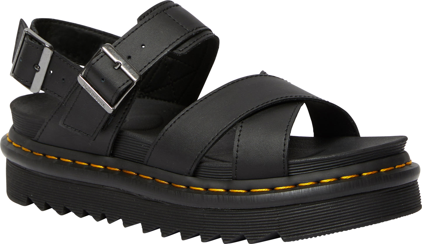 Black leather sandal with cross straps and buckle.