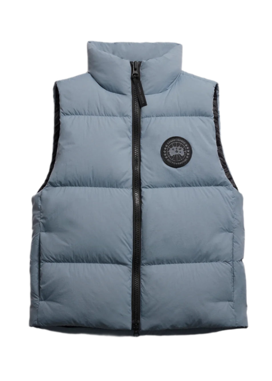 Blue padded vest with black zipper and circular logo.