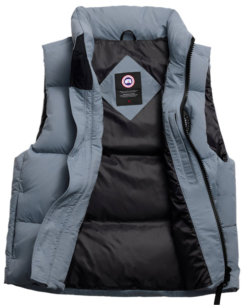 Open gray down vest with black lining and a label on the upper back.