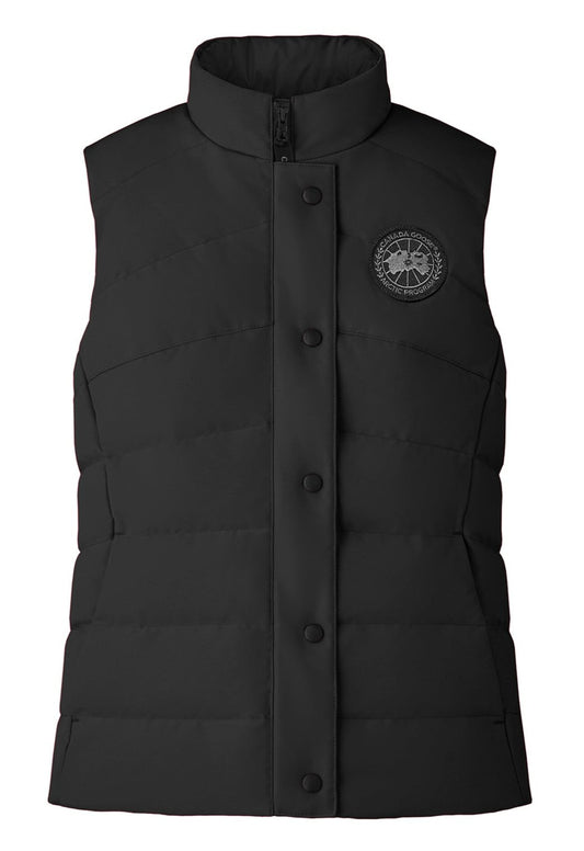 Black padded vest with buttons and a circular patch logo on the left chest.