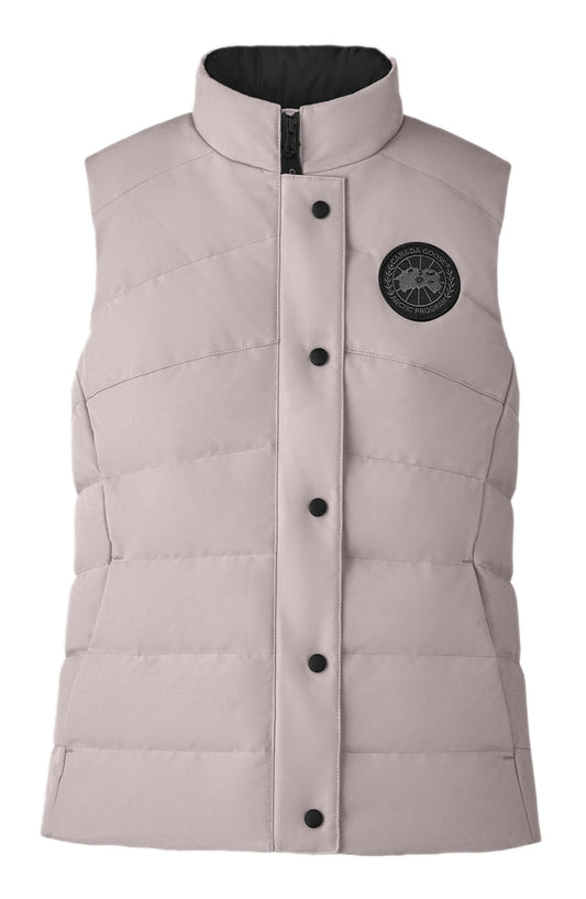 Light pink down filled vest with black circular logo on the chest and black interior.
