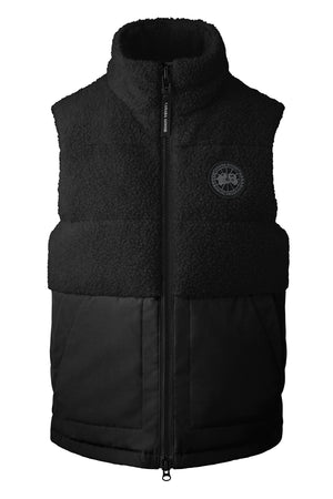 Black fleece vest with a full zipper and circular logo on the chest.