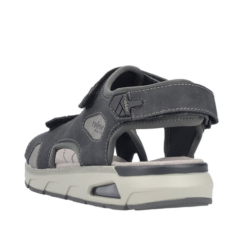 Back view of gray sandal with velcro straps and chunky sole.