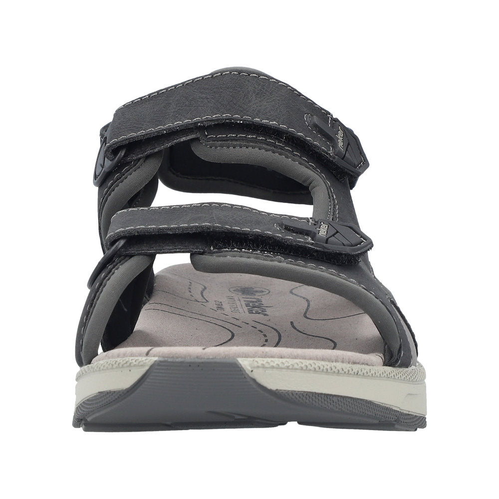 Gray sandal with velcro straps.