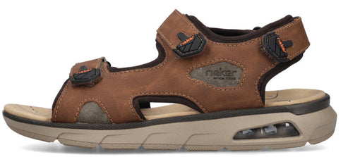 A brown sandal with adjustable velcro straps and a thick, cushioned sole.