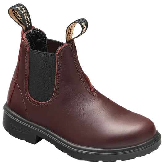 A slip-on ankle boot made of dark burgundy leather with black elastic side panels, a thick black rubber sole, and two fabric pull tabs at the top featuring the text Tasmania Australia.